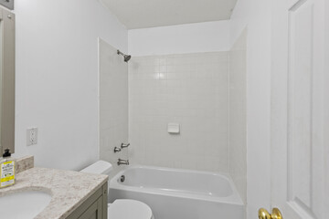 interior of simple ranch style home in the country with original oak hardwood floors, gray walls and white trim. Empty home. Stage with any furniture you would like. 