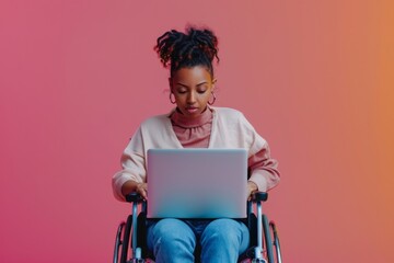 An attentive young woman uses a laptop while seated in a wheelchair against a red and blue background - Powered by Adobe