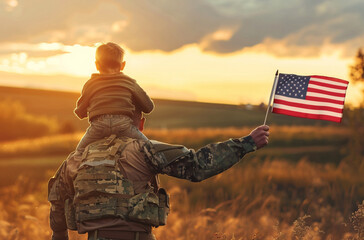 Back view of soldier father holding his child on his shoulders with an American flag, walking in rural field by golden hour. America Independence Day concept