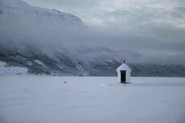 lighthouse in the snow