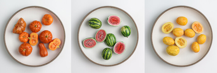 Whole and halves of small ripe juicy watermelons in a round plate. Miniature made of polymer clay.