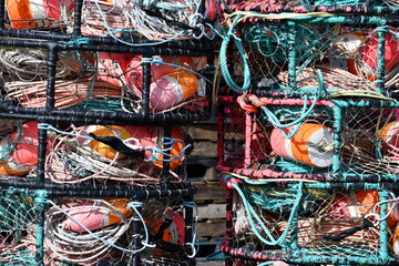 Closeup on crabbing pots. Brightly colored ropes.