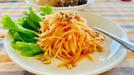 A spicy papaya salad Thailand style.