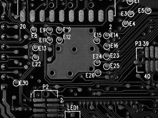 Black electronic circuit close-up. Macro background