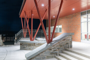 Example of a stainless steel railing along an exterior set of stairs at a public, commercial...