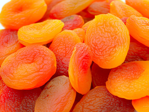 fresh ripe apricots as background, closeup