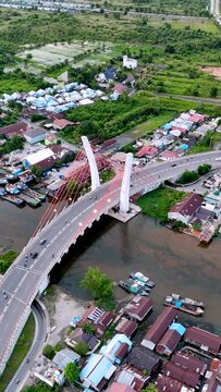 View of the Alalak River Bridge or Basit Bridge from a drone during the day
