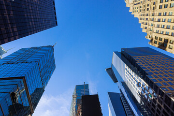 Fototapeta na wymiar Skyscrapers business office buildings bottom up of modern city urban landscape Manhattan New York City USA