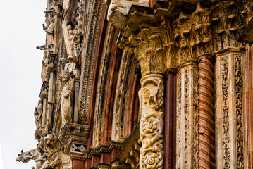 Siena, Italy - May 11 2013: Facade of Siena Baptistery of San Giovanni