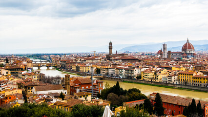 Florence, Italy - May 12 2013: The Florene cityscape from the Arno River - obrazy, fototapety, plakaty