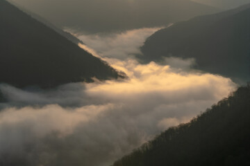 Fototapeta premium clouds over the mountains