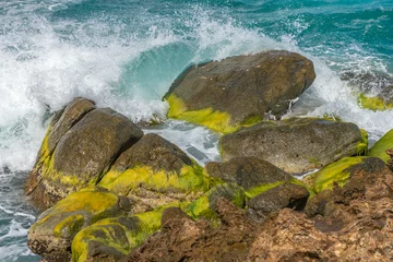 Fotobehang Coastal boulders Aruba © Hans