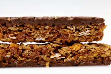 protein bar with chocolate coating isolated on white background.
