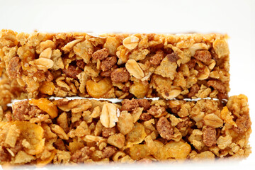 protein bar with chocolate coating isolated on white background.