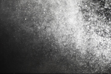 abstract splashes of milk on a black background. Snow texture. Design element.
