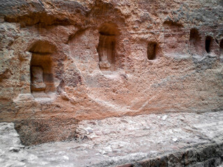 Religious  altars carved into Al Siq gorge wall of Historical Reserve of the Petra near the Wadi Musa city which is home to the Petra in Jordan