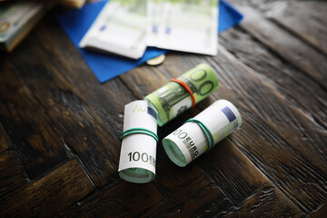 100 euro banknote pack and wood bankground. Currency, financial - obrazy, fototapety, plakaty
