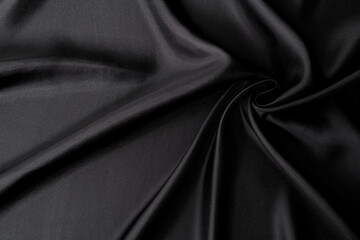 Close up of black silk background