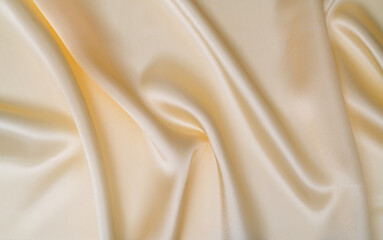 Close up of beige silk background