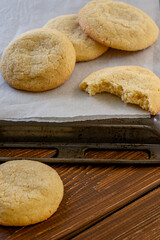 Delicious sugar cookies on wooden table, closeup