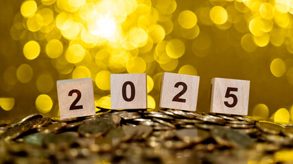 New year number 2025 on heap of coins