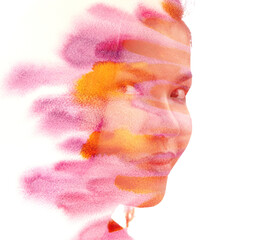 An Asian woman's portrait disappearing into paint splashes in paintography