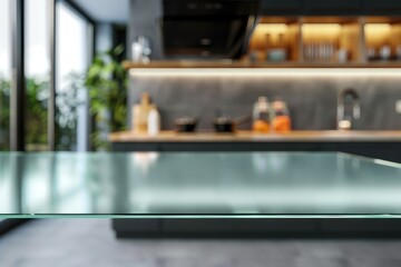 Modern kitchen interior with blurred focus on glass table foreground.