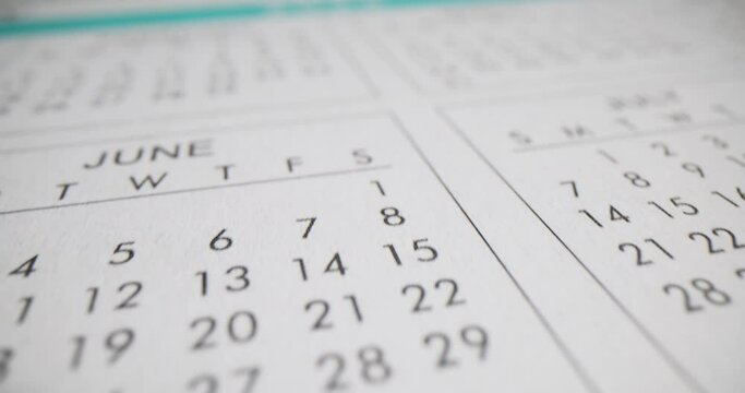Closeup of the 2024 calendar for different months of the year