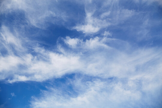 Natural sky background. Blue sky with clouds.