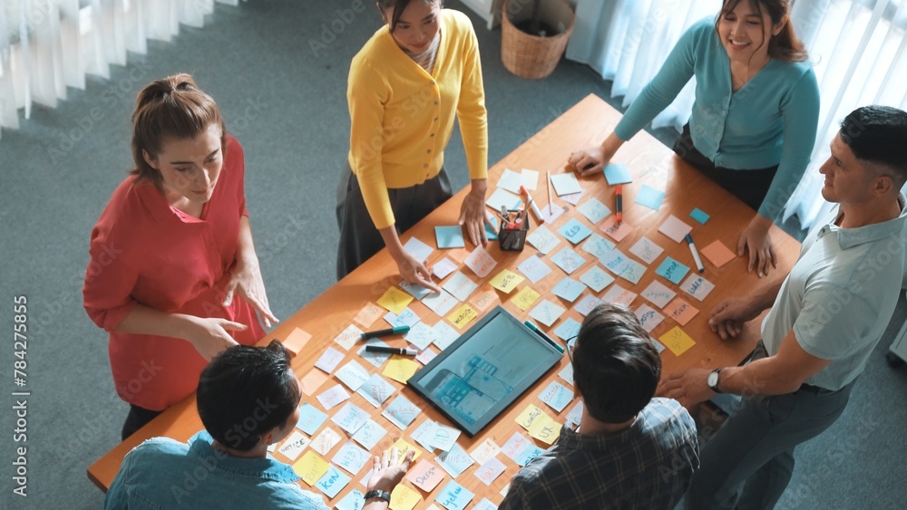 Poster top down view of smart business people shaking hands and making a contract. aerial view of architect