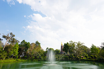 Fototapeta na wymiar Green Garden Around The Pagoda