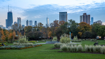 Chicago skyline with skyscrapers viewed from Lincoln Park over lake - obrazy, fototapety, plakaty