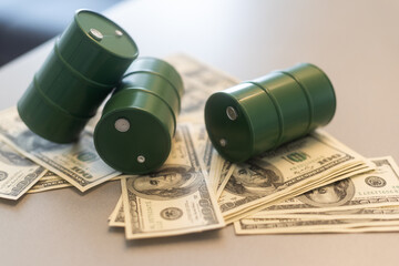 Barrel of crude oil with dollar bills. Close up. Business concept.