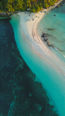 Aerial View of a Beautiful Tropical Beach with Turquoise Water and White Sand