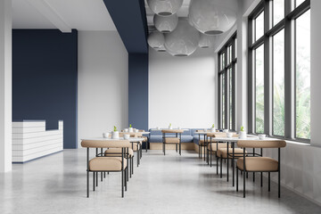 Modern restaurant interior with tables and seating by large windows, minimalist style, bright natural light, concept of dining space. 3D Rendering
