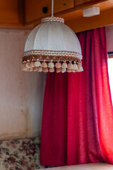 old dirty lampshade in a caravan