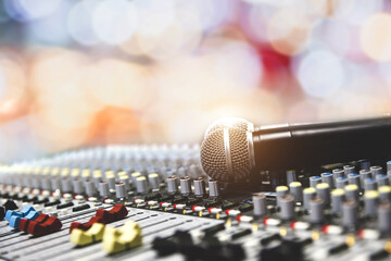 Microphone on sound mixer in live broadcasting studio producer for sound record control system production and audio equipment and music instrument speaker.