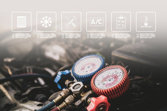 Car measuring manifold gauge on engine for cars care maintenance and service or check refrigerant and filling air conditioner to fix repairing heat conditioning system.