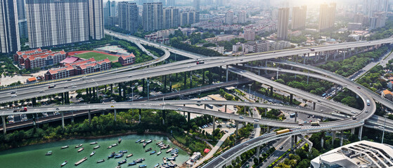 Aerial of city overpasses and buildings