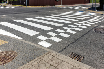 Pedestrian Crossing on a Sunny Day at an Urban Street Intersection