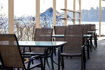 
table and chairs in the outdoor terrace restaurant