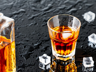 glass of Whisky with ice cubes