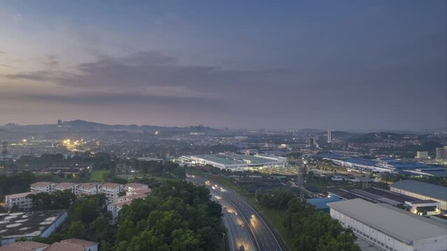 time lapse of transport traffic in highway at selangor, malaysia during sunrise in 4k resolution