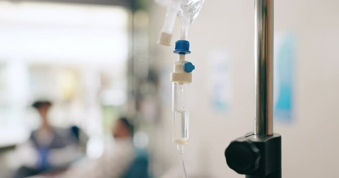 Hospital, healthcare and closeup of IV drip for medicine, infusion and medication dose for patient. Wellness, clinic and people with liquid antibiotics for treatment, sickness and medical service