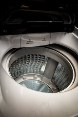 Detergent and softener tray inside a top load washing machine