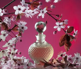 vintage bottle of perfume with spring flowers - 784331468
