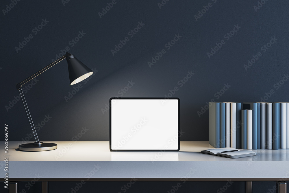 Poster modern concrete workplace with lamp, books and white mock up tablet. workspace close up. 3d renderin