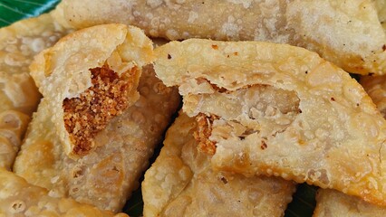 Indian Sweet item Popularly Known as Karanji or Gujiya is served on Bowl