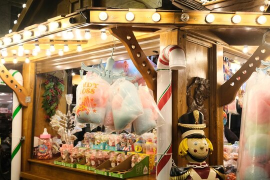 Closeup view of a Christmas Market stall with candy floss and a toy soldier