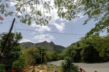 Mountain asphalt road leading to Cerro Las Tetas in Salinas, Puerto Rico